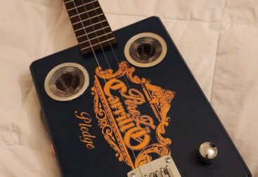 black cigar box guitar