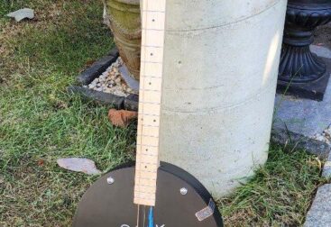 round cigar box guitar