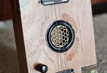 wooden cigar box guitar with honeycomb