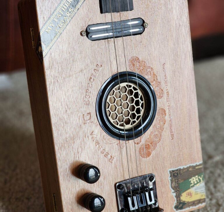 wooden cigar box guitar with honeycomb