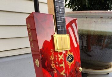 red cigar box guitar