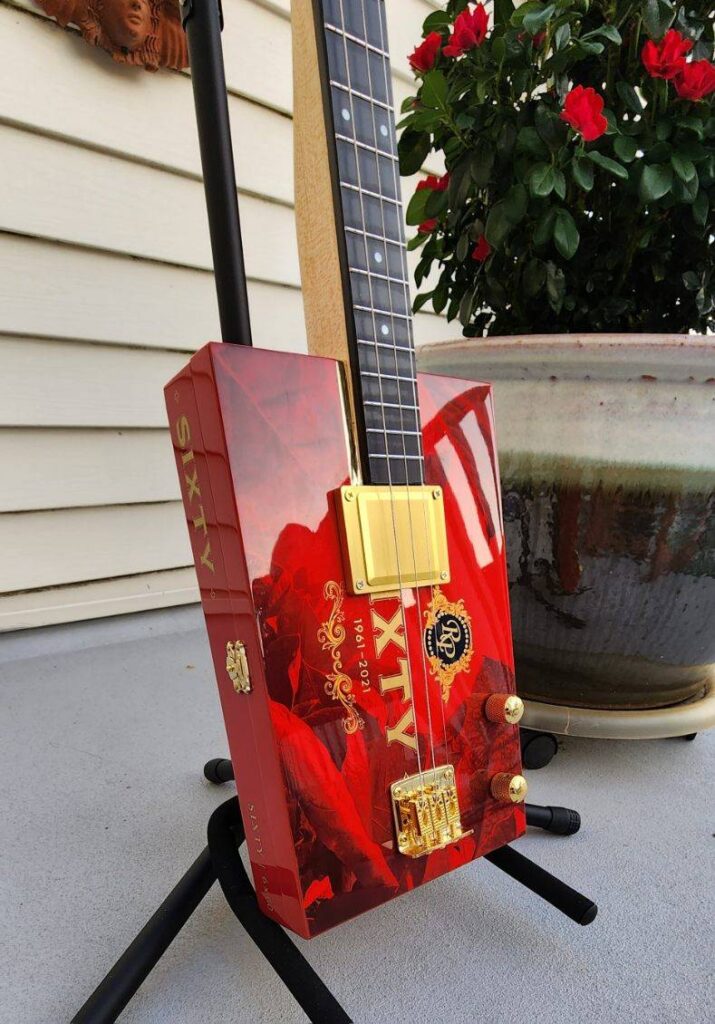 red cigar box guitar