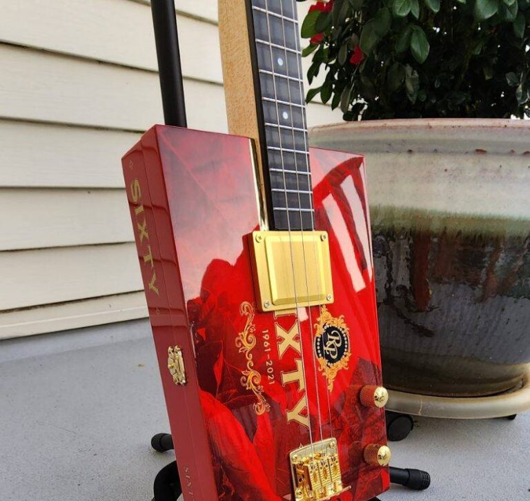 red cigar box guitar