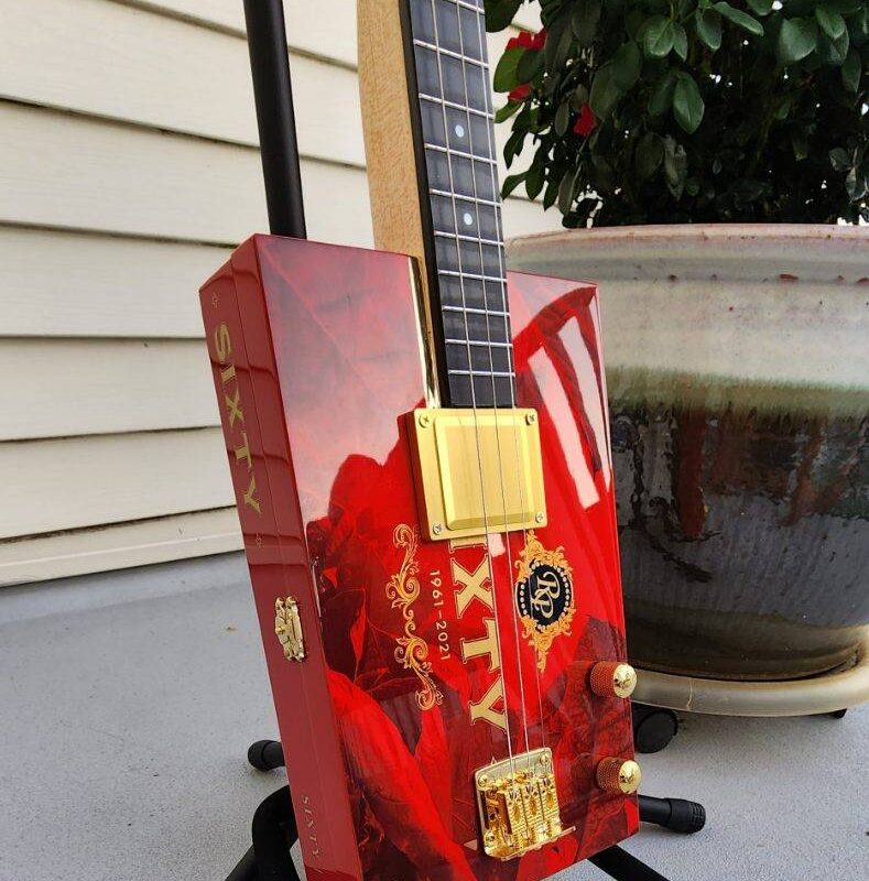 red cigar box guitar