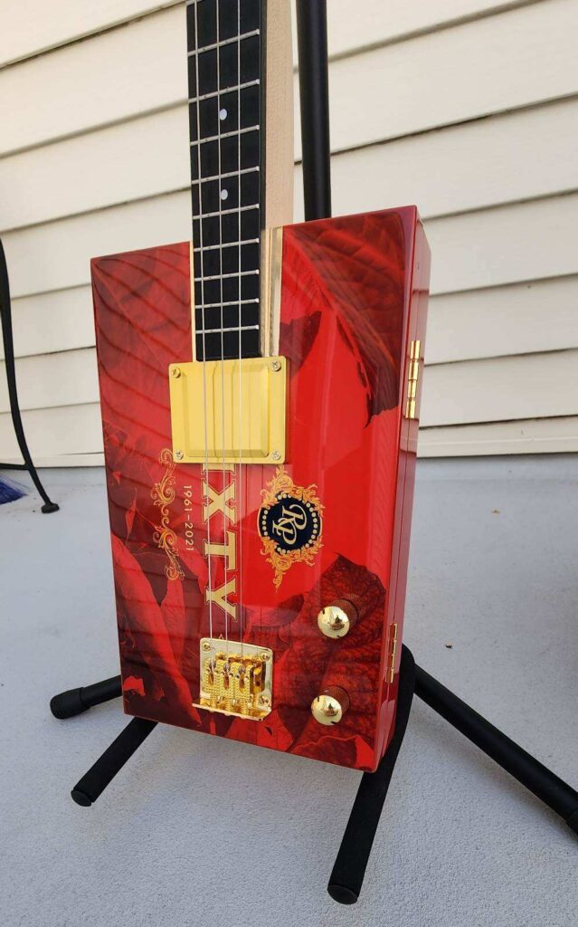 red cigar box guitar